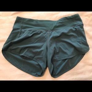 Lululemon teal shorts 4” long size 6